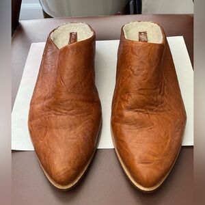 Shearling lined mules by Kelsi Dagger